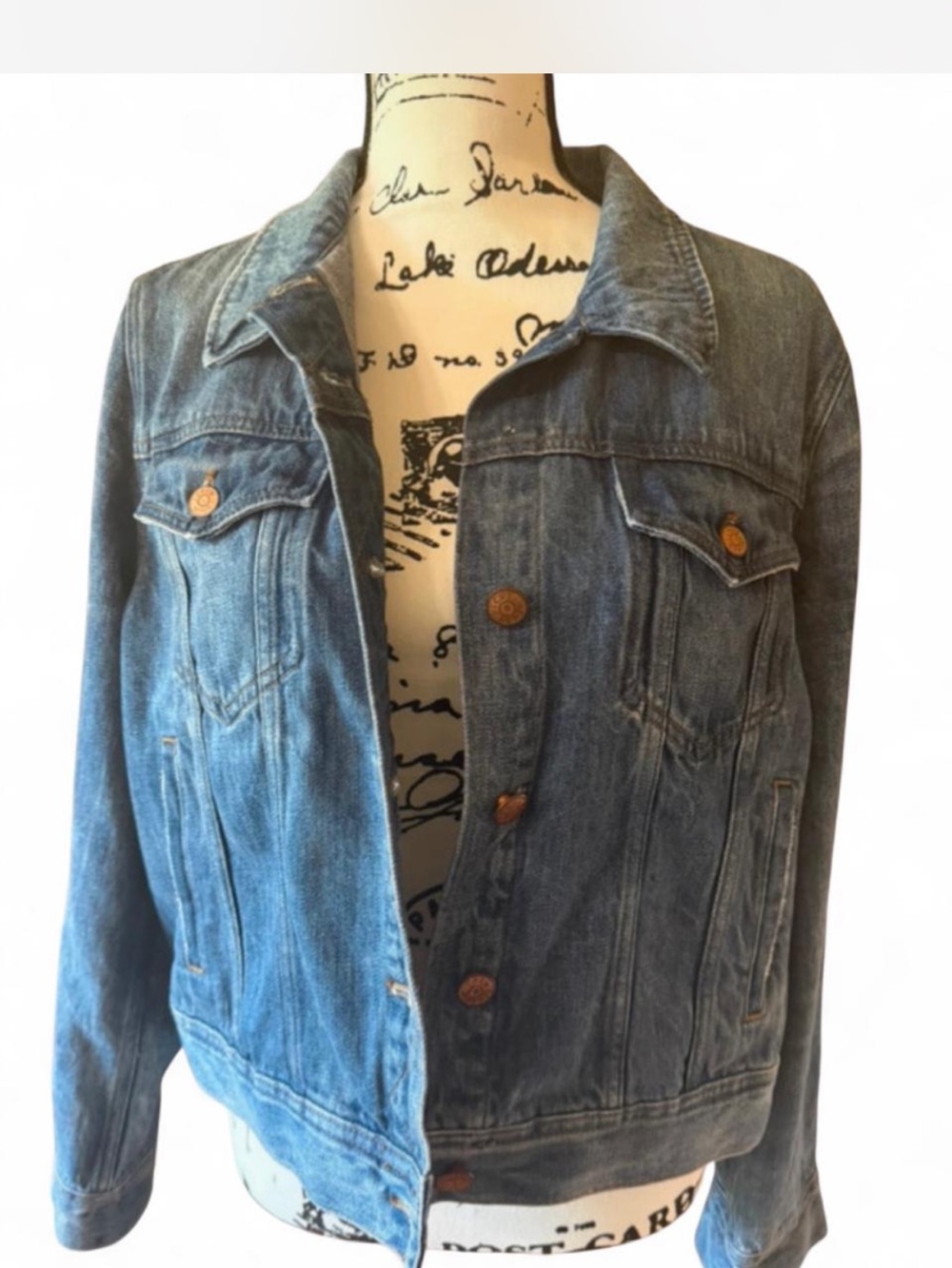 Classic J.Crew women's denim jacket in an indigo wash, standard trucker jacket.